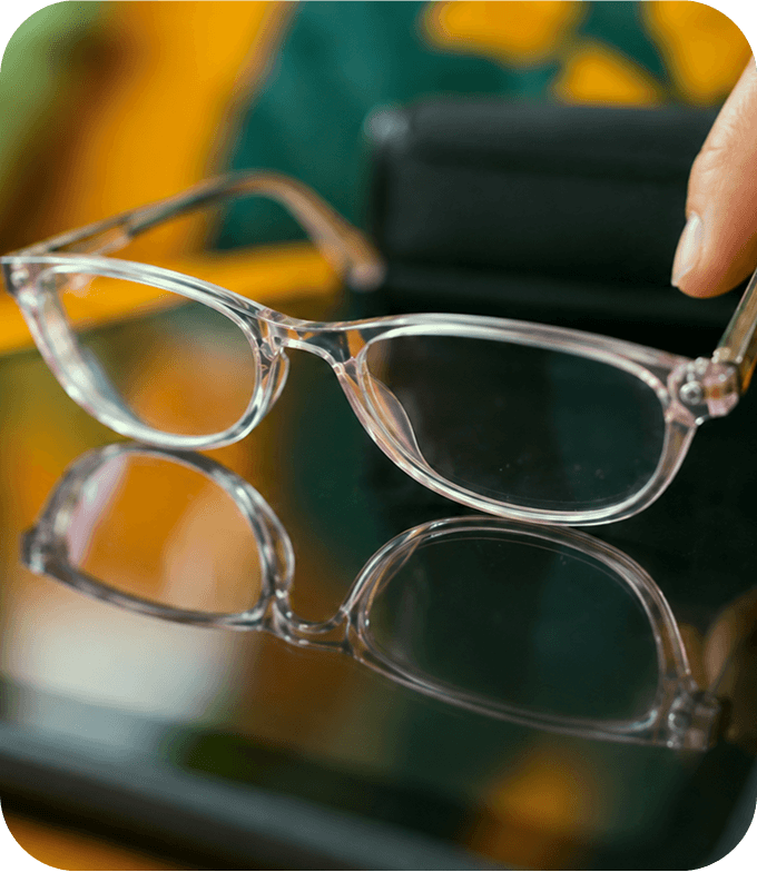 Eyeglasses resting on a printed report