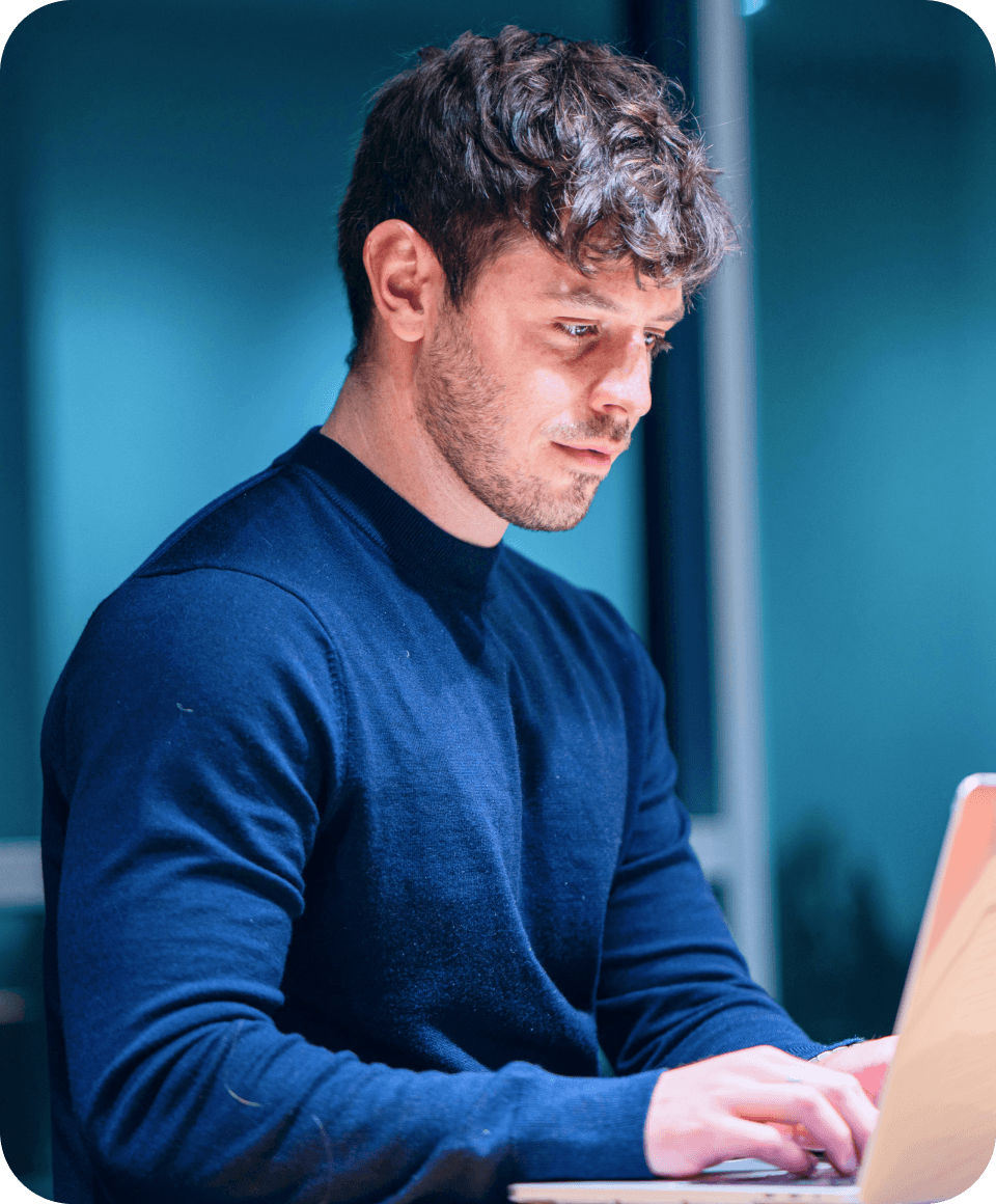 A consultant concentrating on work at a computer