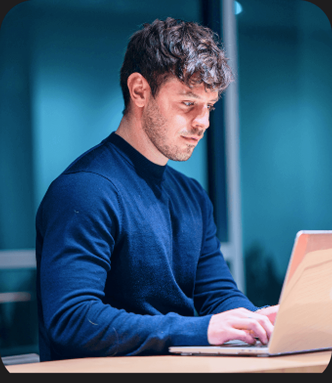 A consultant concentrating on work at a computer