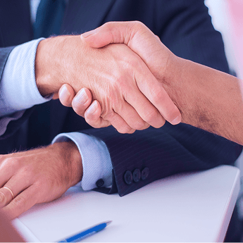 Two business partners shaking hands